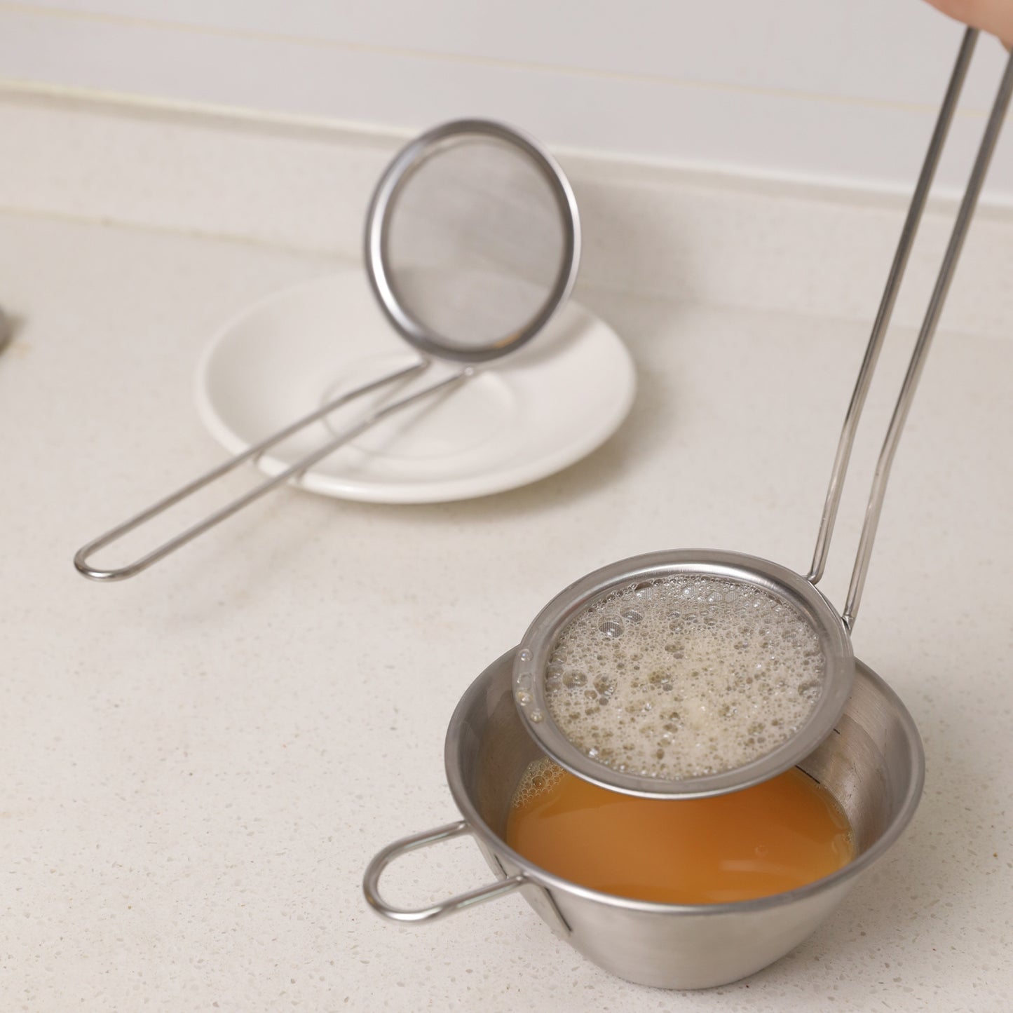 Skimming spoon