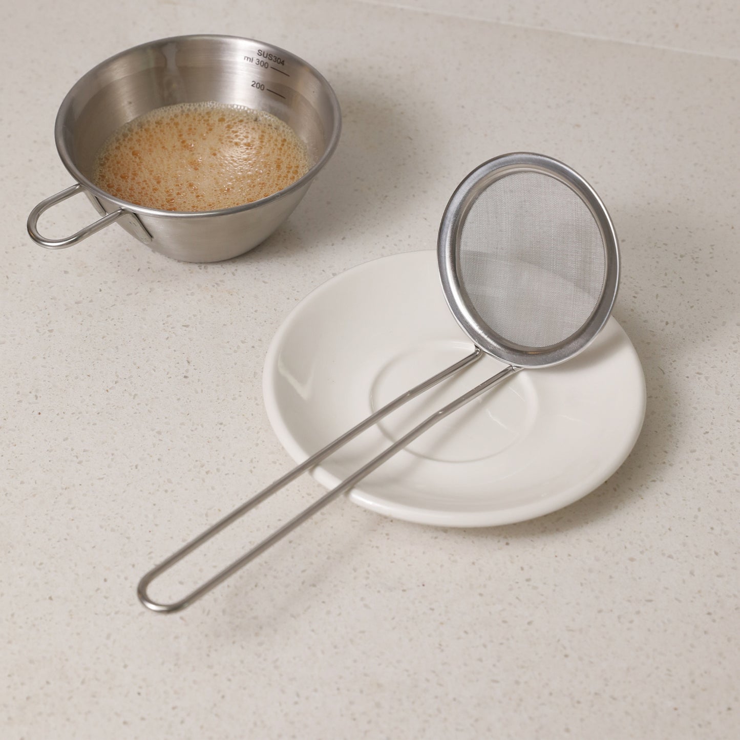 Skimming spoon